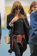 DAKOTA JOHNSON Arrives at Airport in Vancouver