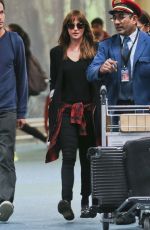 DAKOTA JOHNSON Arrives at Airport in Vancouver