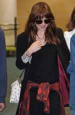 DAKOTA JOHNSON Arrives at Airport in Vancouver