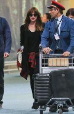 DAKOTA JOHNSON Arrives at Airport in Vancouver