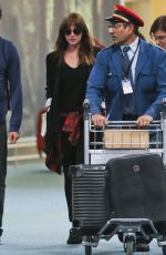 DAKOTA JOHNSON Arrives at Airport in Vancouver