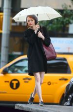 EMMA STONE on Rainy Day Out in new York