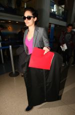 EMMY ROSSUM Arrives at a Flight at LAX Airport