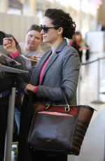 EMMY ROSSUM Arrives at a Flight at LAX Airport