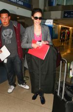 EMMY ROSSUM Arrives at a Flight at LAX Airport