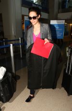 EMMY ROSSUM Arrives at a Flight at LAX Airport