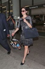 EMMY ROSSUM at LAX Airport in Los Angeles 1010