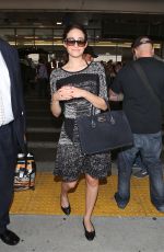 EMMY ROSSUM at LAX Airport in Los Angeles 1010