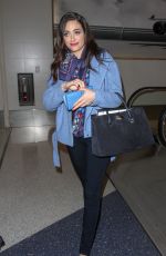 EMMY ROSSUM Catching a Flight at LAX Airport in Los Angeles