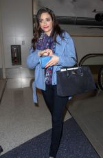 EMMY ROSSUM Catching a Flight at LAX Airport in Los Angeles