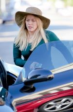 HILARY DUFF in Ripped Denim Out in Los Angeles