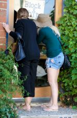 HILARY DUFF in Ripped Denim Out in Los Angeles