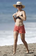 HILARY SWANK in Bikini Top at a Beach in Malibu