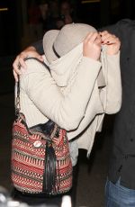 JENNIFER LAWRENCE Hiding from Paps at LAX Airport