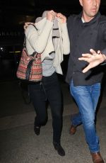 JENNIFER LAWRENCE Hiding from Paps at LAX Airport