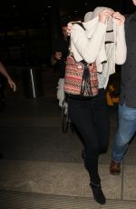 JENNIFER LAWRENCE Hiding from Paps at LAX Airport