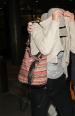 JENNIFER LAWRENCE Hiding from Paps at LAX Airport