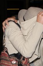 JENNIFER LAWRENCE Hiding from Paps at LAX Airport