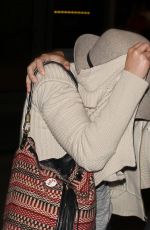 JENNIFER LAWRENCE Hiding from Paps at LAX Airport