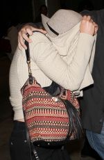JENNIFER LAWRENCE Hiding from Paps at LAX Airport