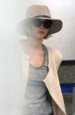 JENNIFER LAWRENCE Hiding from Paps at LAX Airport