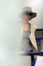 JENNIFER LAWRENCE Hiding from Paps at LAX Airport