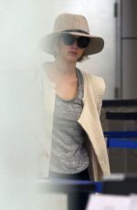JENNIFER LAWRENCE Hiding from Paps at LAX Airport