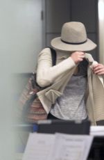 JENNIFER LAWRENCE Hiding from Paps at LAX Airport