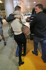JENNIFER LAWRENCE Hiding from Paps at LAX Airport