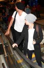 KALEY CUOCO and Ryan Sweeting Arrives at LAX Airport in Los Angeles 2410