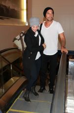 KALEY CUOCO and Ryan Sweeting Arrives at LAX Airport in Los Angeles 2410