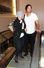 KALEY CUOCO and Ryan Sweeting Arrives at LAX Airport in Los Angeles 2410