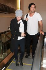KALEY CUOCO and Ryan Sweeting Arrives at LAX Airport in Los Angeles 2410
