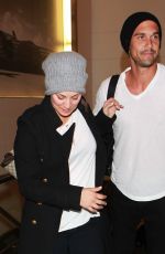 KALEY CUOCO and Ryan Sweeting Arrives at LAX Airport in Los Angeles 2410