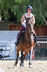 KALEY CUOCO Riding Her Horse in Moorpark