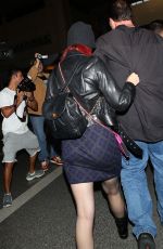 KATY PERRY Arrives at Los Angeles Internationa Airport 2010