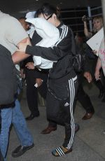 KATY PERRY Hiding Face in pillow at LAX Airport