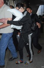 KATY PERRY Hiding Face in pillow at LAX Airport