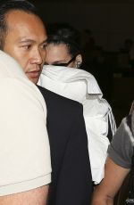 KATY PERRY Hiding Face in pillow at LAX Airport