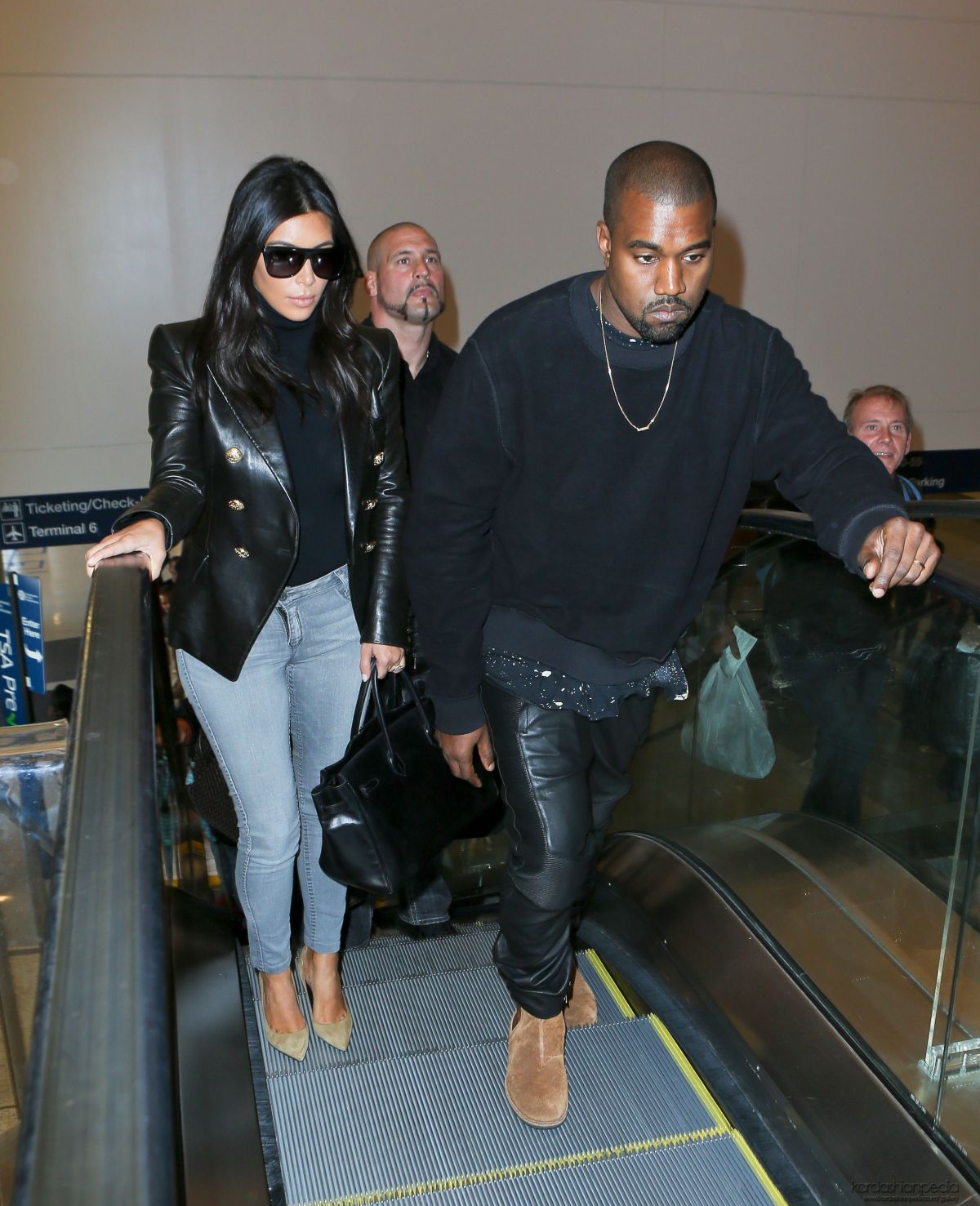 KIM KARDASHIAN and Kanje West at Los Angeles International Airport 2610 KIM KARDASHIAN and Kanje West at Los Angeles International Airport 2610