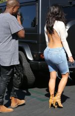 KIM KARDASHIAN in Denim and Kanye West Leaves a Movie Theater in Valabasas