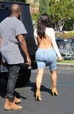KIM KARDASHIAN in Denim and Kanye West Leaves a Movie Theater in Valabasas