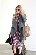 LEANN RIMES at LAX Airport in Los Angeles 1310