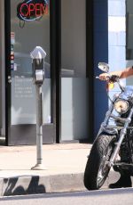 LILY COLLINS and Boyfriend Riding a Motorcycle Out in Los Angeles