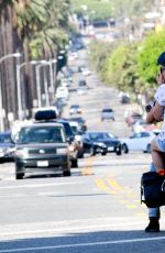 LILY COLLINS and Boyfriend Riding a Motorcycle Out in Los Angeles