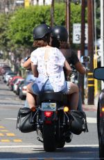 LILY COLLINS and Boyfriend Riding a Motorcycle Out in Los Angeles