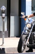 LILY COLLINS and Boyfriend Riding a Motorcycle Out in Los Angeles