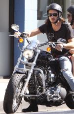 LILY COLLINS and Boyfriend Riding a Motorcycle Out in Los Angeles