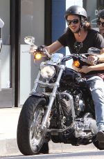 LILY COLLINS and Boyfriend Riding a Motorcycle Out in Los Angeles