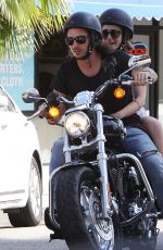 LILY COLLINS and Boyfriend Riding a Motorcycle Out in Los Angeles